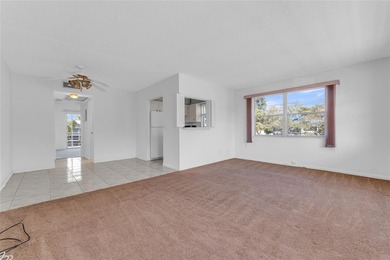 Enjoy peaceful living in this spacious 1-bedroom, 1.5-bath on Hillsboro Pines Golf in Florida - for sale on GolfHomes.com, golf home, golf lot