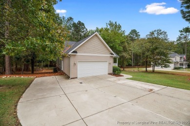 Step inside this charming 3-bedroom, 2-bath home featuring a on Carolina Lakes Country Club in North Carolina - for sale on GolfHomes.com, golf home, golf lot