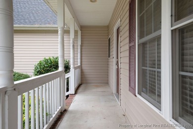 Step inside this charming 3-bedroom, 2-bath home featuring a on Carolina Lakes Country Club in North Carolina - for sale on GolfHomes.com, golf home, golf lot