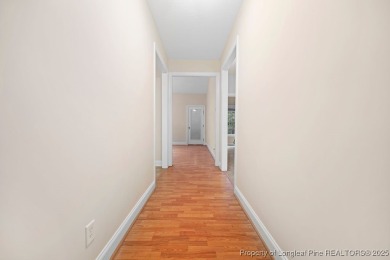 Step inside this charming 3-bedroom, 2-bath home featuring a on Carolina Lakes Country Club in North Carolina - for sale on GolfHomes.com, golf home, golf lot