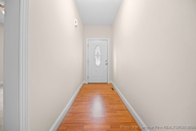 Step inside this charming 3-bedroom, 2-bath home featuring a on Carolina Lakes Country Club in North Carolina - for sale on GolfHomes.com, golf home, golf lot
