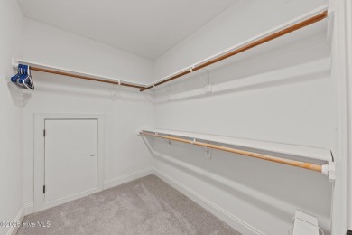 This meticulously maintained 4-bedroom corner unit offers an on Pinehurst Resort and Country Club in North Carolina - for sale on GolfHomes.com, golf home, golf lot