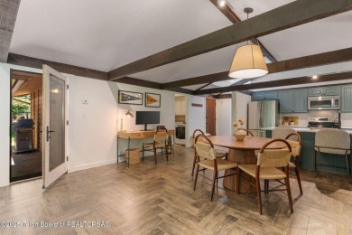 Refined Mountain Living Meets Short-Term Rental Opportunity in on Jackson Hole Golf and Tennis Club in Wyoming - for sale on GolfHomes.com, golf home, golf lot