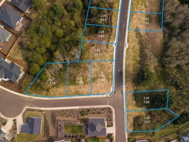 An excellent opportunity to purchase a lot with forested views on Chinook Winds Golf Resort in Oregon - for sale on GolfHomes.com, golf home, golf lot