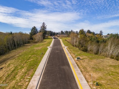 An excellent opportunity to purchase a lot with forested views on Chinook Winds Golf Resort in Oregon - for sale on GolfHomes.com, golf home, golf lot