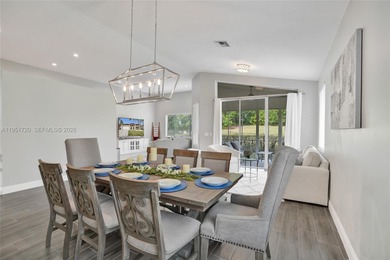 ENJOY LIVING & RELAXING IN THIS GORGEOUS REMODELED HOME WITH on Woodmont Country Club in Florida - for sale on GolfHomes.com, golf home, golf lot