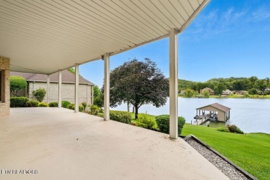 Welcome to this spacious 4,324 sq ft lakefront home perfectly on Tellico Village Golf Club in Tennessee - for sale on GolfHomes.com, golf home, golf lot