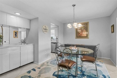 Fully Furnished Palm Aire Home with Sunroom, Golf Course Views & on Palm Aire Country Club of Sarasota in Florida - for sale on GolfHomes.com, golf home, golf lot