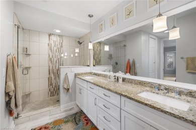 This nicely updated second-floor end-unit coach home, located in on Windstar on Naples Bay in Florida - for sale on GolfHomes.com, golf home, golf lot