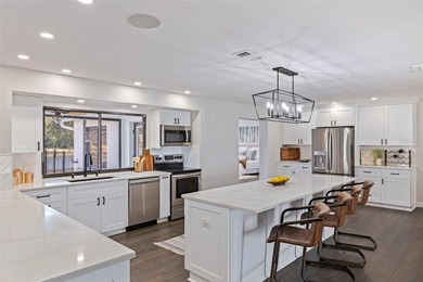 NO FLOODING OR HURRICANE DAMAGE Ultimate peace of mind awaits in on Seminole Lake Country Club in Florida - for sale on GolfHomes.com, golf home, golf lot