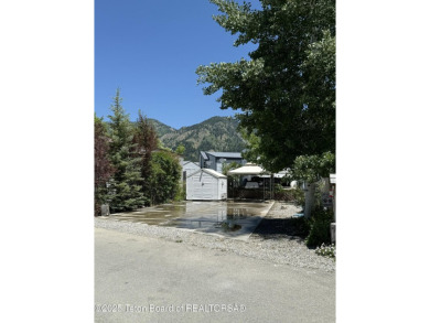 Great RV Pad with mature landscaping, Mountain views,  concrete on Star Valley RV Golf Course in Wyoming - for sale on GolfHomes.com, golf home, golf lot