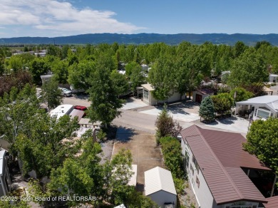 Great RV Pad with mature landscaping, Mountain views,  concrete on Star Valley RV Golf Course in Wyoming - for sale on GolfHomes.com, golf home, golf lot