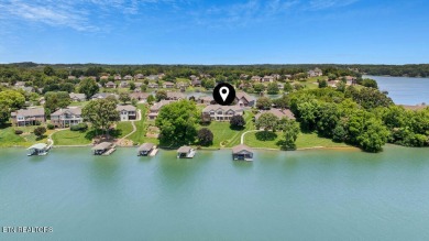 Welcome to this spacious 4,324 sq ft lakefront home perfectly on Tellico Village Golf Club in Tennessee - for sale on GolfHomes.com, golf home, golf lot