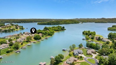 Welcome to this spacious 4,324 sq ft lakefront home perfectly on Tellico Village Golf Club in Tennessee - for sale on GolfHomes.com, golf home, golf lot