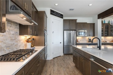 Exquisite 1 story, 3 bedroom, 3 bath + office home on coveted on Kissing Tree Golf Club in Texas - for sale on GolfHomes.com, golf home, golf lot
