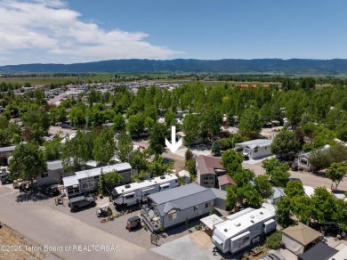 Great RV Pad with mature landscaping, Mountain views,  concrete on Star Valley RV Golf Course in Wyoming - for sale on GolfHomes.com, golf home, golf lot