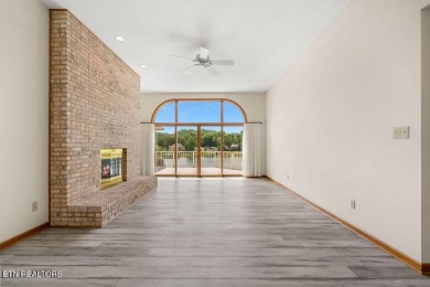 Welcome to this spacious 4,324 sq ft lakefront home perfectly on Tellico Village Golf Club in Tennessee - for sale on GolfHomes.com, golf home, golf lot