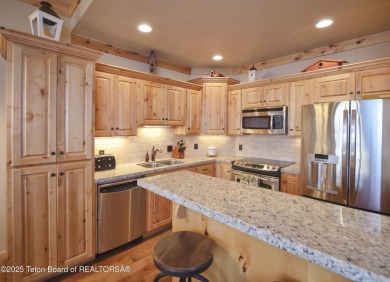 This fully furnished second floor, 2-bedroom, 2-bathroom on Teton Springs Resort and Club in Idaho - for sale on GolfHomes.com, golf home, golf lot