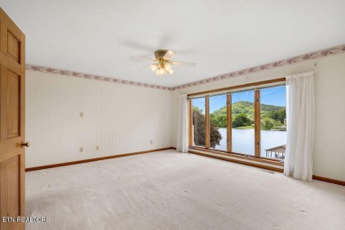 Welcome to this spacious 4,324 sq ft lakefront home perfectly on Tellico Village Golf Club in Tennessee - for sale on GolfHomes.com, golf home, golf lot