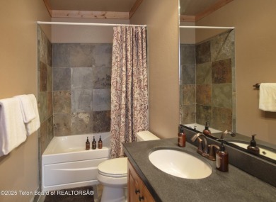 This fully furnished second floor, 2-bedroom, 2-bathroom on Teton Springs Resort and Club in Idaho - for sale on GolfHomes.com, golf home, golf lot