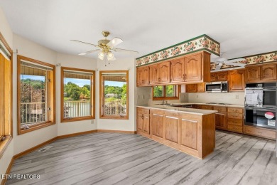 Welcome to this spacious 4,324 sq ft lakefront home perfectly on Tellico Village Golf Club in Tennessee - for sale on GolfHomes.com, golf home, golf lot