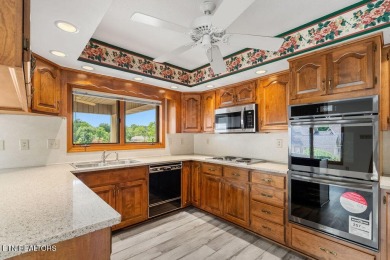 Welcome to this spacious 4,324 sq ft lakefront home perfectly on Tellico Village Golf Club in Tennessee - for sale on GolfHomes.com, golf home, golf lot