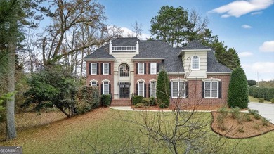 This stunning home in the prestigious gated with security guard on Whitewater Creek in Georgia - for sale on GolfHomes.com, golf home, golf lot