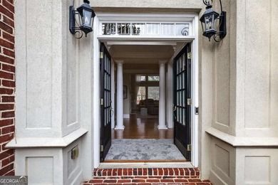 This stunning home in the prestigious gated with security guard on Whitewater Creek in Georgia - for sale on GolfHomes.com, golf home, golf lot