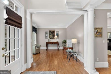 This stunning home in the prestigious gated with security guard on Whitewater Creek in Georgia - for sale on GolfHomes.com, golf home, golf lot