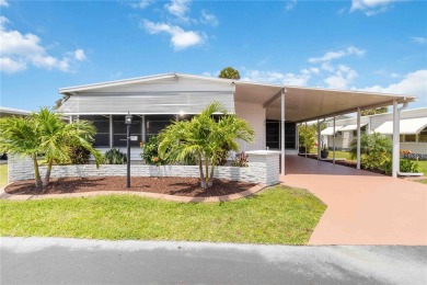 Welcome to this exquisitely remodeled residence in the highly on Twin Isles Country Club in Florida - for sale on GolfHomes.com, golf home, golf lot