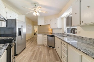 Welcome to this exquisitely remodeled residence in the highly on Twin Isles Country Club in Florida - for sale on GolfHomes.com, golf home, golf lot