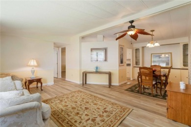 Welcome to this exquisitely remodeled residence in the highly on Twin Isles Country Club in Florida - for sale on GolfHomes.com, golf home, golf lot