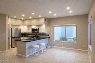 Turnkey, fully remodeled first-floor condo with golf-course on Painted Desert Golf Club in Nevada - for sale on GolfHomes.com, golf home, golf lot