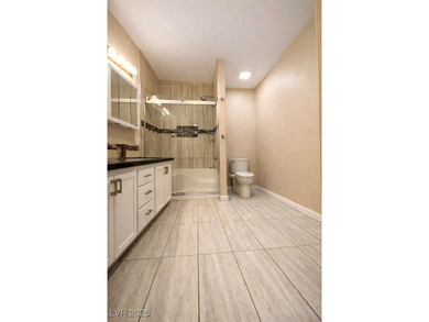 Turnkey, fully remodeled first-floor condo with golf-course on Painted Desert Golf Club in Nevada - for sale on GolfHomes.com, golf home, golf lot