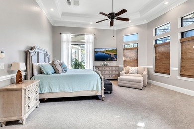 Tucked away within the highly sought-after-gated community of on Emerald Bay Golf Club in Florida - for sale on GolfHomes.com, golf home, golf lot