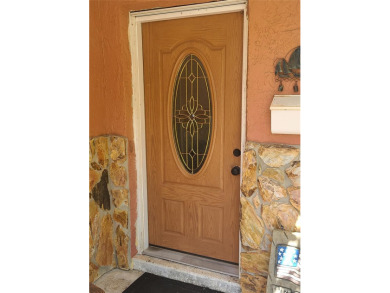 Family Estate home with over 2,000 s/f of living space on Bayou Golf Club in Florida - for sale on GolfHomes.com, golf home, golf lot