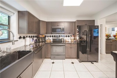 This 2/2/2 single family home situated on the beautiful Martin on Martin Downs Country Club in Florida - for sale on GolfHomes.com, golf home, golf lot