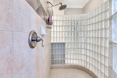 Tucked away within the highly sought-after-gated community of on Emerald Bay Golf Club in Florida - for sale on GolfHomes.com, golf home, golf lot