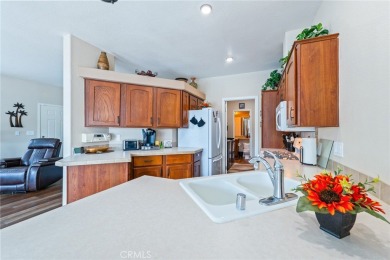 Welcome to this stunning single-story home nestled in the highly on Rivers Edge Golf Course in California - for sale on GolfHomes.com, golf home, golf lot
