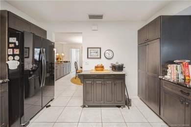 This 2/2/2 single family home situated on the beautiful Martin on Martin Downs Country Club in Florida - for sale on GolfHomes.com, golf home, golf lot