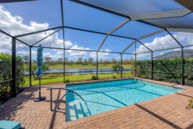 Must see NOW.  Pool home on Sarasota National's lake side. NO on Venice East Golf Club in Florida - for sale on GolfHomes.com, golf home, golf lot