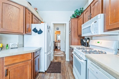 Welcome to this stunning single-story home nestled in the highly on Rivers Edge Golf Course in California - for sale on GolfHomes.com, golf home, golf lot