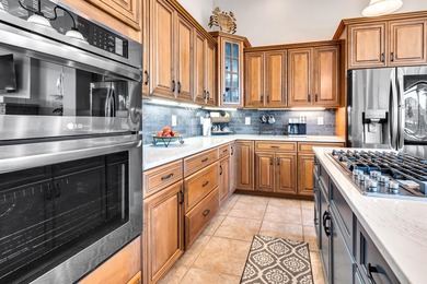 Tucked away within the highly sought-after-gated community of on Emerald Bay Golf Club in Florida - for sale on GolfHomes.com, golf home, golf lot