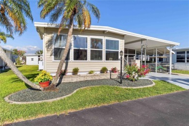 Welcome to this beautifully decorated and impeccably maintained on Twin Isles Country Club in Florida - for sale on GolfHomes.com, golf home, golf lot