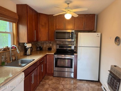 This 3 bed, 3 bath contemporary home is located less than a mile on The Hideout Golf in Pennsylvania - for sale on GolfHomes.com, golf home, golf lot
