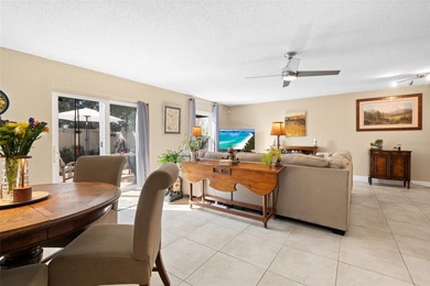 Welcome home to Mediterranean Manor, an idyllic waterfront on The Dunedin Country Club in Florida - for sale on GolfHomes.com, golf home, golf lot