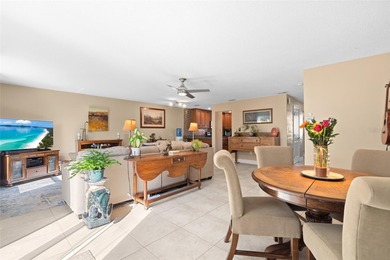 Welcome home to Mediterranean Manor, an idyllic waterfront on The Dunedin Country Club in Florida - for sale on GolfHomes.com, golf home, golf lot