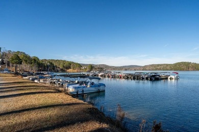 Welcome home to this beautifully built Craftsman-style residence on The Highlands Course at Lake Arrowhead in Georgia - for sale on GolfHomes.com, golf home, golf lot