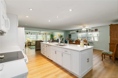 Welcome to effortless Florida living in this beautifully on Twin Isles Country Club in Florida - for sale on GolfHomes.com, golf home, golf lot