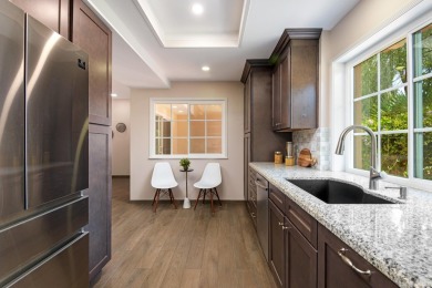 Offering a fresh, contemporary take on turn-key living, this on Ocean Meadows Golf Course in California - for sale on GolfHomes.com, golf home, golf lot